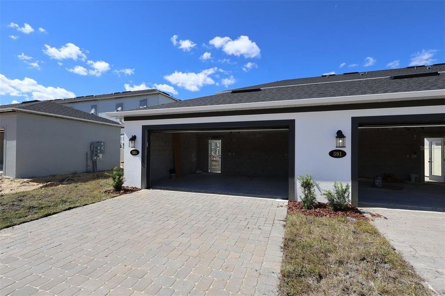 Exterior details and patio area of a home in Emerson Pointe, Apopka (Image 19). Exterior details and patio area of a home in Emerson Pointe, Apopka (Image 19).