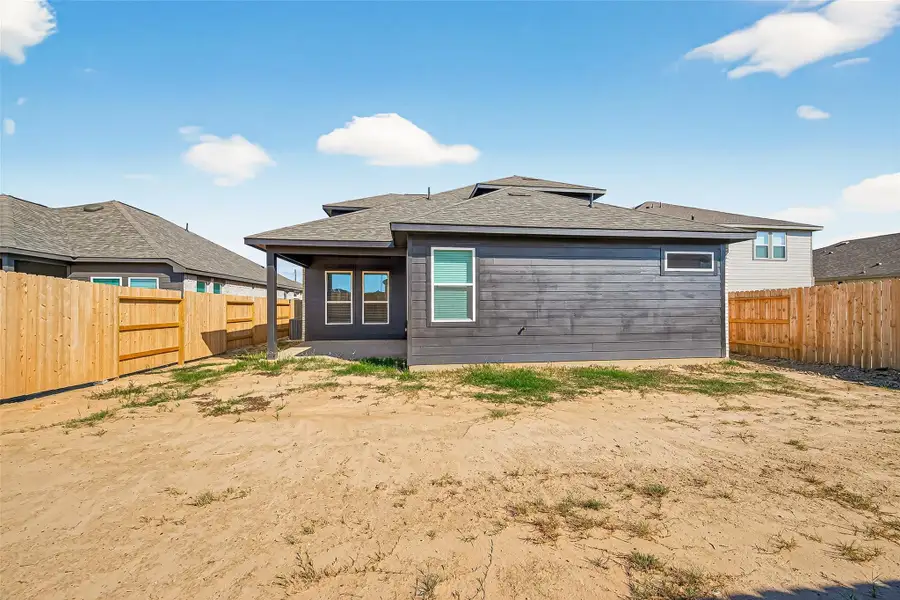 Exterior details and patio area of a home in Sunterra, Katy (Image 4). Exterior details and patio area of a home in Sunterra, Katy (Image 4).