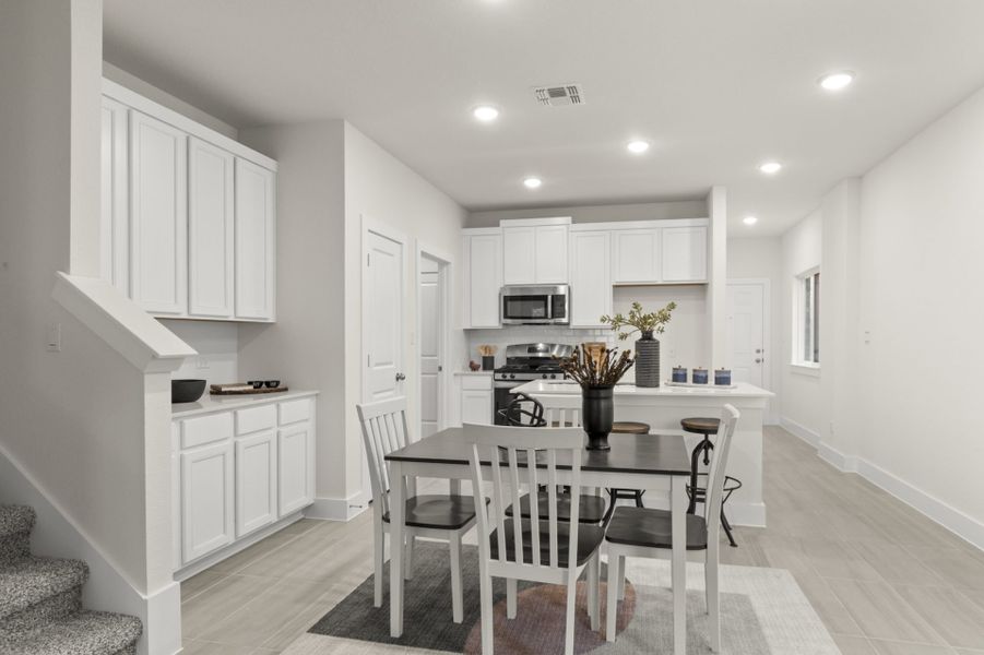 Representative furnished interior of a home built from the Brazos by Pacesetter Homes in Saddle Creek Twinhomes, Georgetown (Image 34).