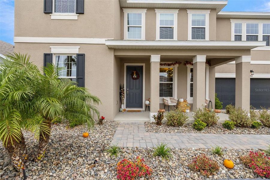 Exterior details and patio area of a home in Seaire, Parrish (Image 30).