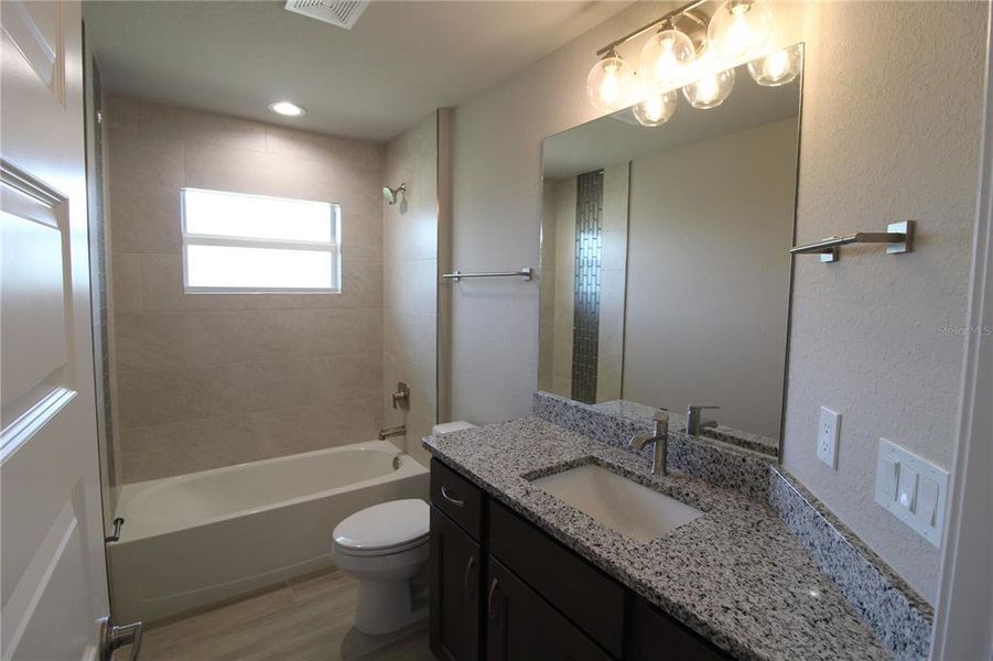 Furnished interior view inside a new home in , Port Charlotte (Image 3). Furnished interior view inside a new home in , Port Charlotte (Image 3).