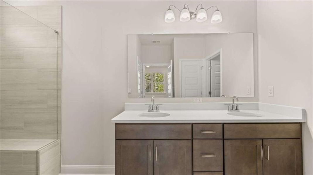 Furnished interior view inside a new home in Oak Ridge Meadows - Active Adult, Locust Grove (Image 10).