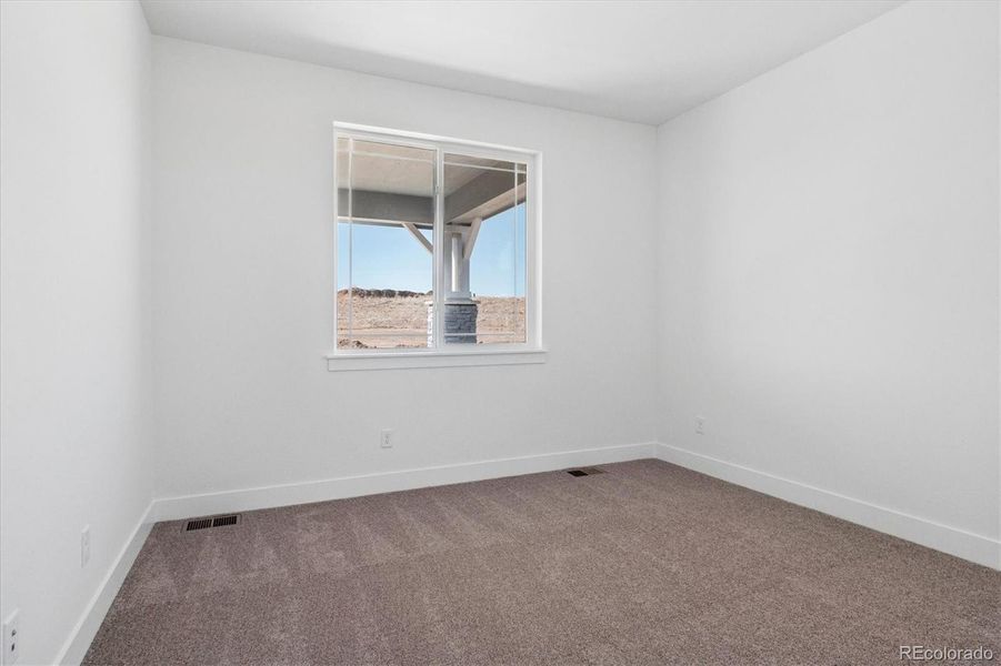 Spacious, unfurnished interior of a new home in Peakview at Ascent Village, Littleton (Image 35).