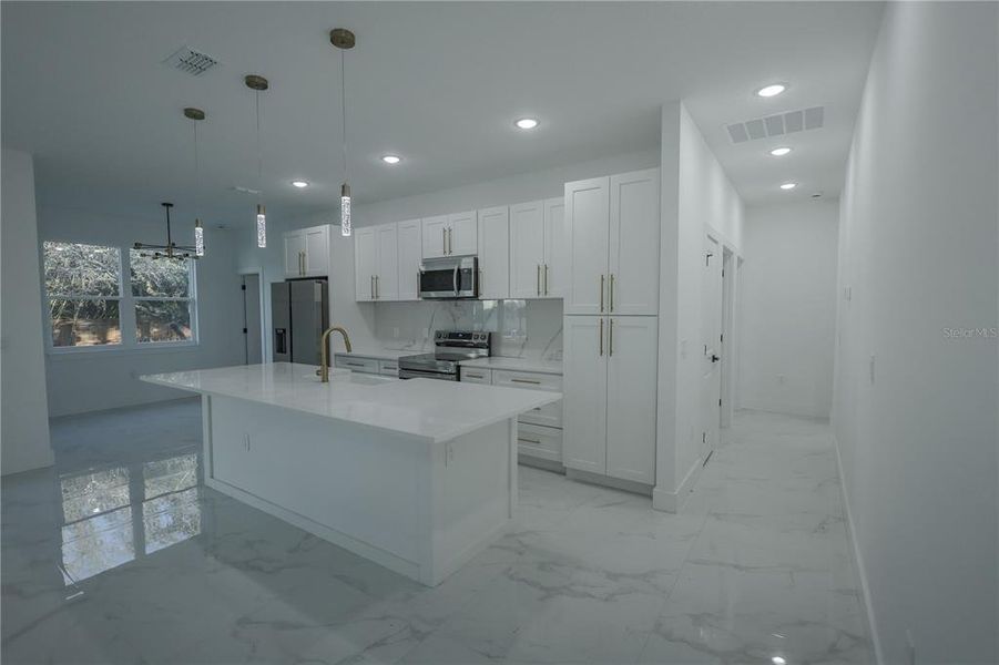 Furnished interior view inside a new home in , Deltona (Image 5).