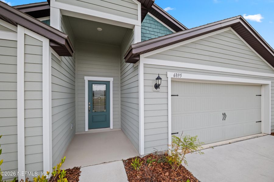 Exterior details and patio area of a home in Westport Landing, Jacksonville (Image 3).