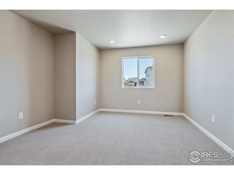 Spacious, unfurnished interior of a new home in The Overlook at Johnstown Farms, Johnstown (Image 17).