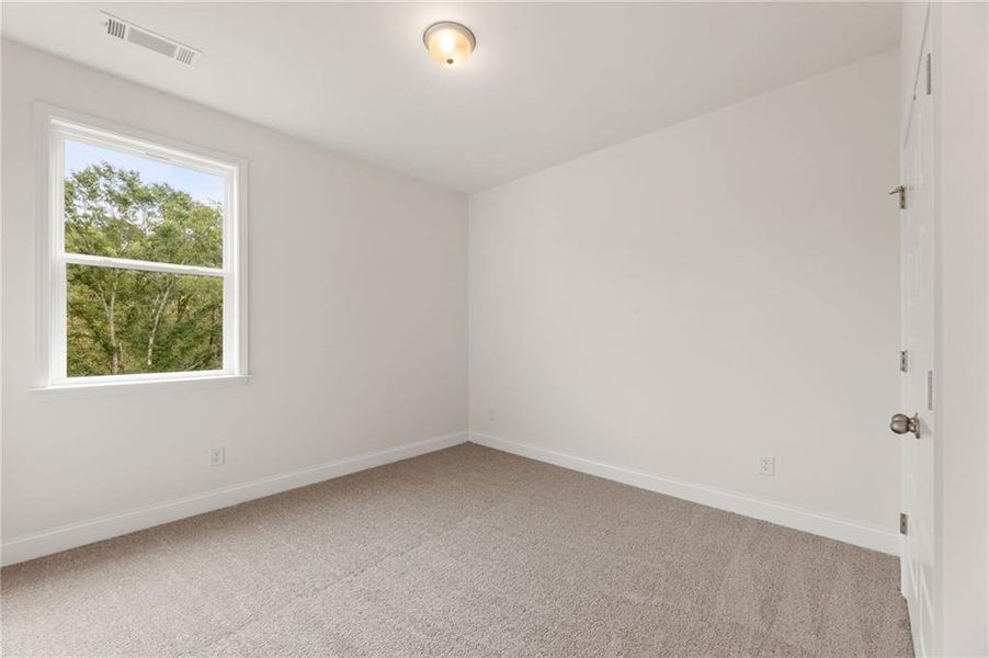 Spacious, unfurnished interior of a new home in Clark Farms, Flowery Branch (Image 28).