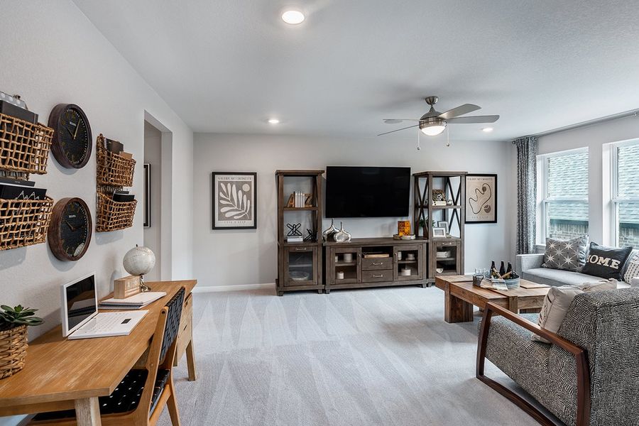 Representative furnished interior of a home built from the Bordeaux by Taylor Morrison in Travisso, Leander (Image 11).