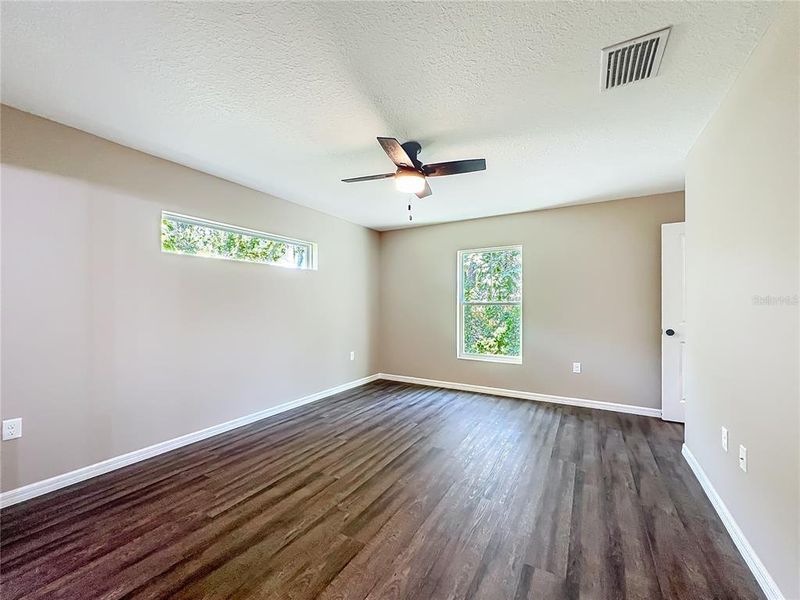 Spacious, unfurnished interior of a new home in , Lake Panasoffkee (Image 22).