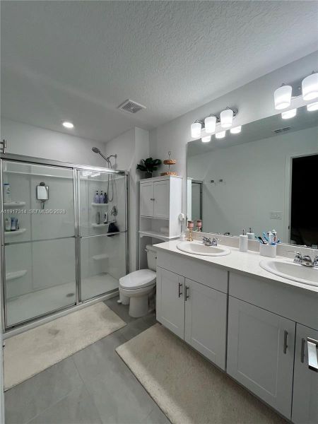 Furnished interior view inside a new home in The Townhomes at Bellalago, Kissimmee (Image 11).