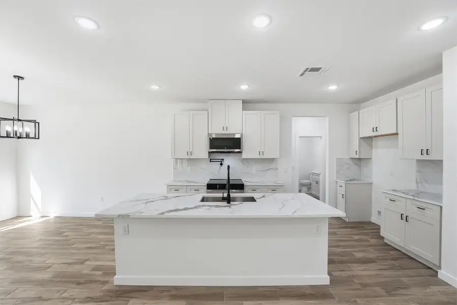 Furnished interior view inside a new home in , Conroe (Image 5). Furnished interior view inside a new home in , Conroe (Image 5).