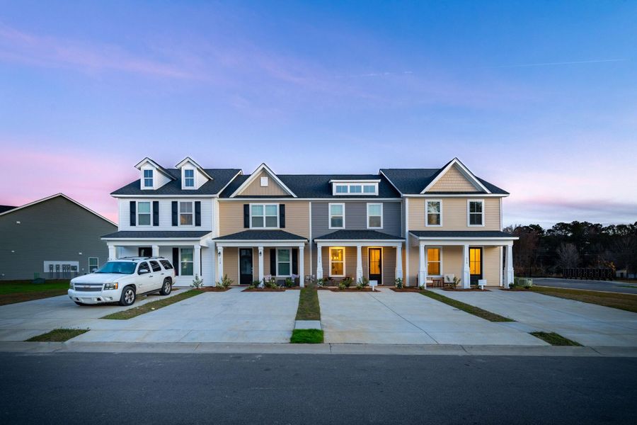 Front exterior of a new home in Abbey Walk, Moncks Corner, SC, highlighting curb appeal (Image 2). Front exterior of a new home in Abbey Walk, Moncks Corner, SC, highlighting curb appeal (Image 2).