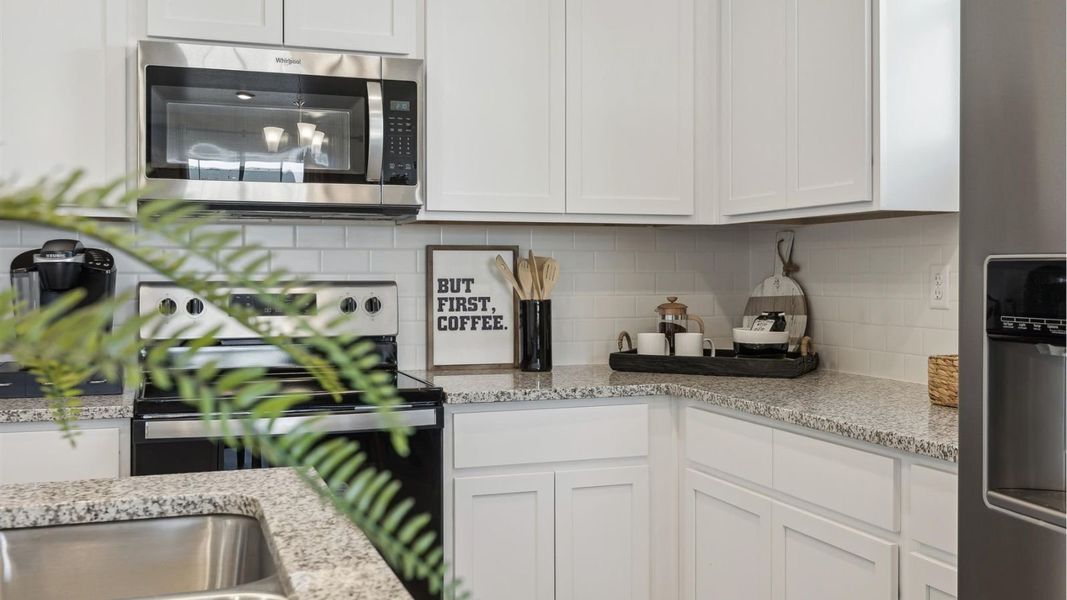 Furnished interior view inside a new home in Settlers Crossing, Commerce City (Image 8).