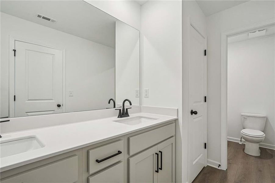 Furnished interior view inside a new home in Eastlyn Crossing - Single Family, Flowery Branch (Image 12). Furnished interior view inside a new home in Eastlyn Crossing - Single Family, Flowery Branch (Image 12).