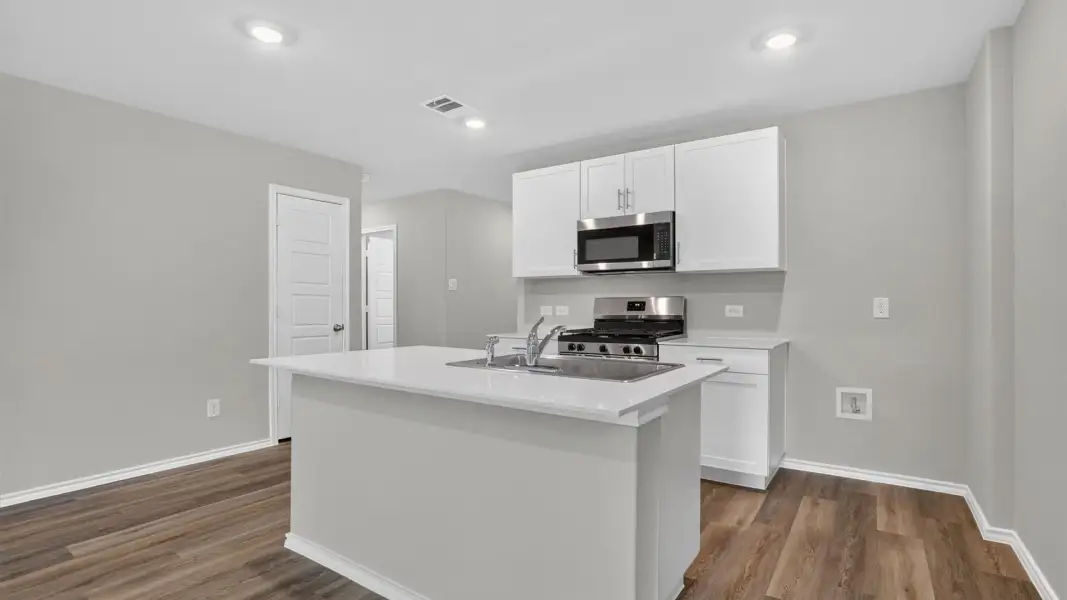 Furnished interior view inside a new home in Monarch at the Meadows, Ponder (Image 6).