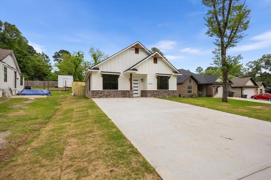 Front exterior of a new home in , Tyler, TX, highlighting curb appeal (Image 16).