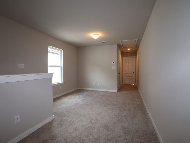 Spacious, unfurnished interior of a new home in Heritage, Dripping Springs (Image 8).