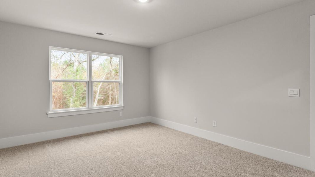Spacious, unfurnished interior of a new home in Lockwood Landing, Supply (Image 23).