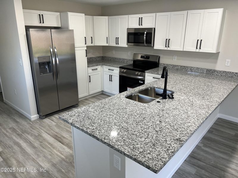Furnished interior view inside a new home in , Jacksonville (Image 4).