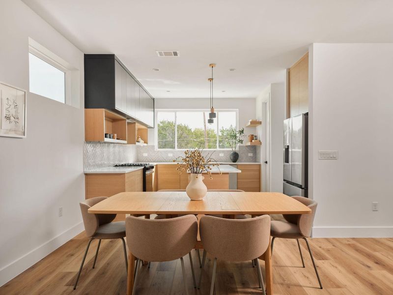 Dining area featuring light wood-style flooring