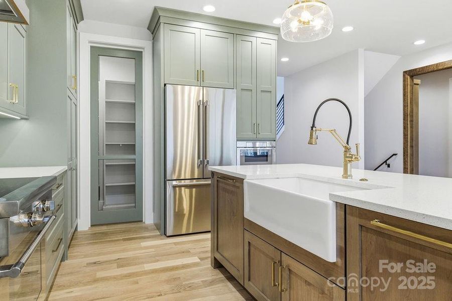 Expansive walk-in pantry with custom shelving