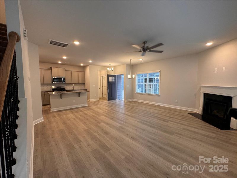 Family room looking towards kitchen and front door