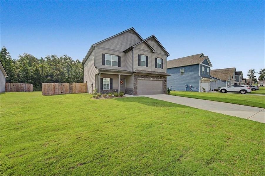 Front exterior of a new home in , Rome, GA, highlighting curb appeal (Image 28).