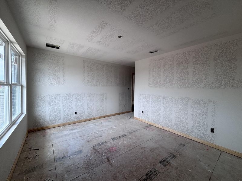 Spacious, unfurnished interior of a new home in The Colony 45s, Bastrop (Image 29).