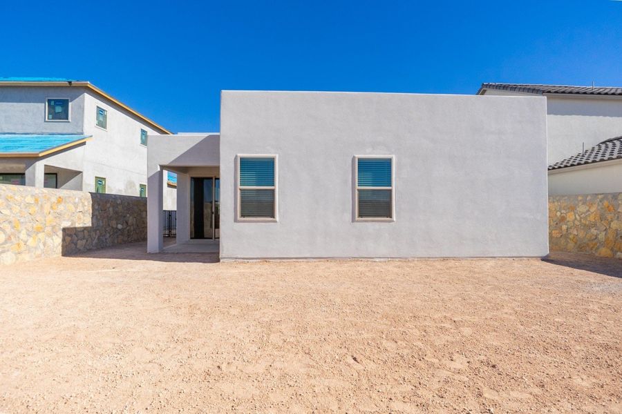 Exterior details and patio area of a home in Paseo Del Este, El Paso (Image 20).