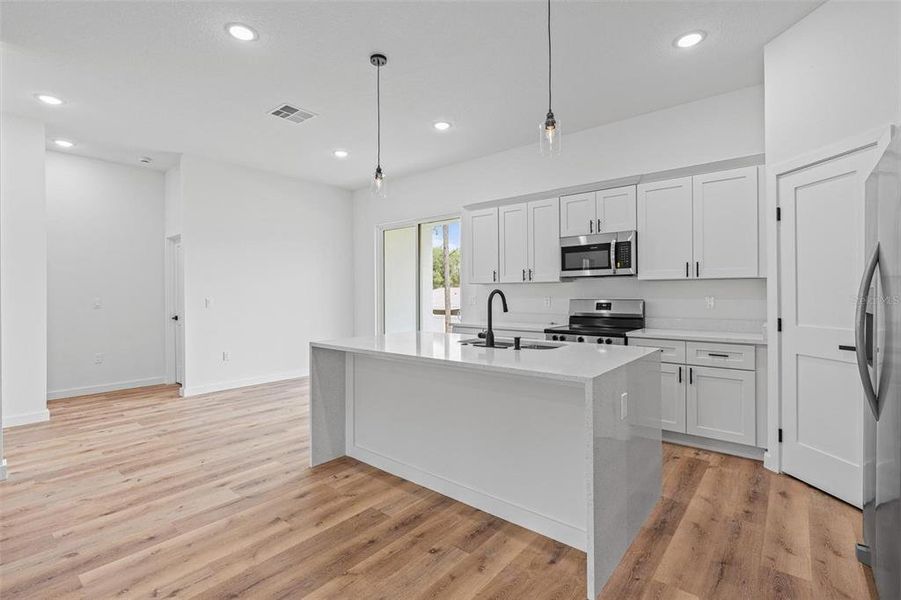 Furnished interior view inside a new home in , Citrus Springs (Image 13).
