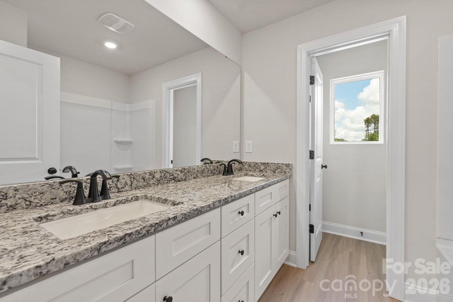 Furnished interior view inside a new home in Ascot Woods, Charlotte (Image 3).