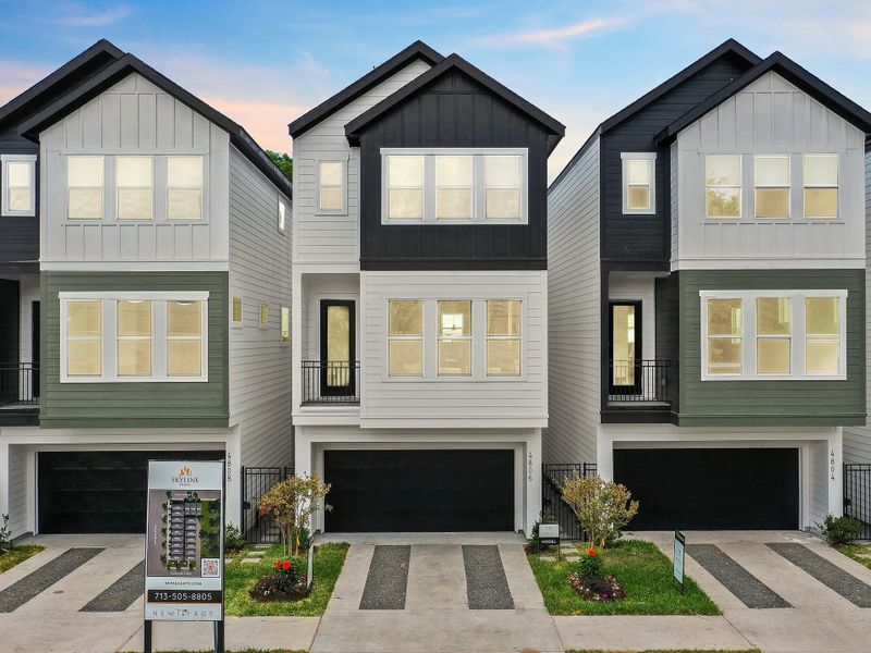 Front exterior of a new home in Skyline Homes at Cavalcade, Houston, TX, highlighting curb appeal (Image 23).
