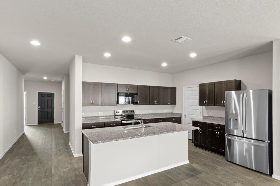 Furnished interior view inside a new home in Oaks at San Gabriel, Georgetown (Image 10).