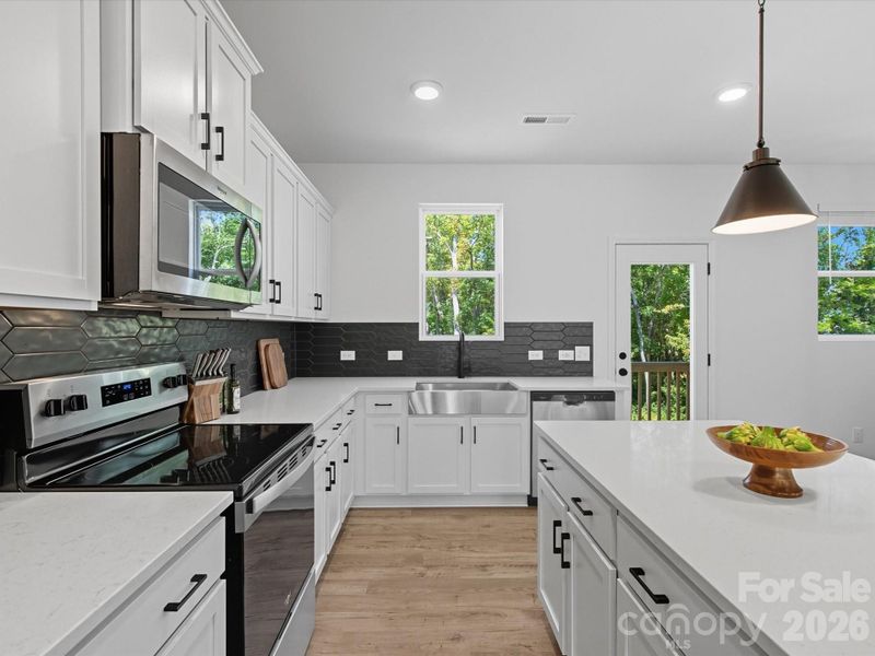 Furnished interior view inside a new home in The Landings at Catawba River, Charlotte (Image 32).