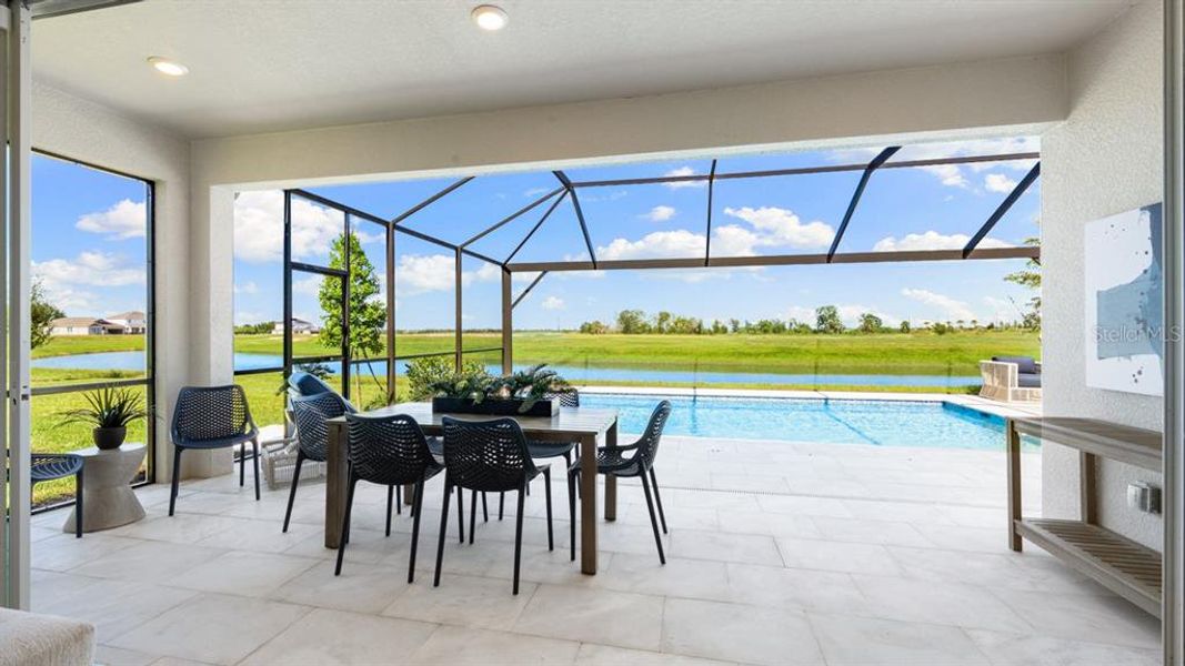 Exterior details and patio area of a home in Palms at Coasterra, Palmetto (Image 3).