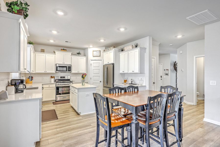 Furnished interior view inside a new home in Limehouse Village: Arbor Series, Summerville (Image 29). Furnished interior view inside a new home in Limehouse Village: Arbor Series, Summerville (Image 29).