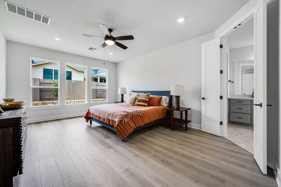 Furnished interior view inside a new home in 6 Creeks, Kyle (Image 10).