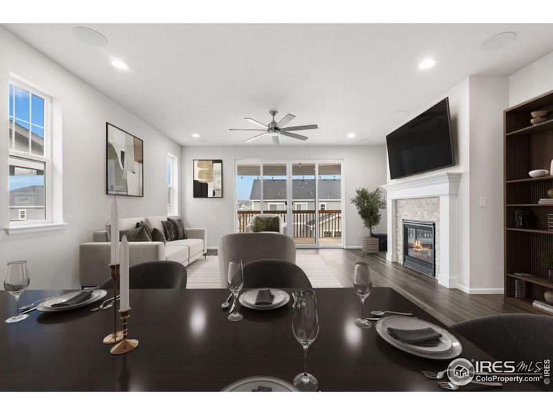 This photo has been virtually staged to provide visual ideas for how furniture can be arranged in this area of the home.