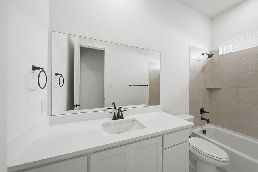 Furnished interior view inside a new home in Light Farms Brenham - 40' Lots, Celina (Image 6).