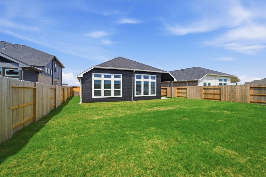 Exterior details and patio area of a home in Creekhaven, Arcola (Image 28).