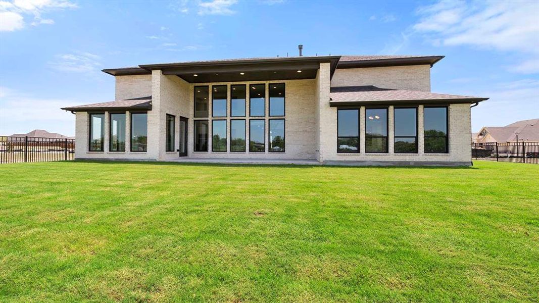 Front exterior of a new home in Terraces 82'/100', Rockwall, TX, highlighting curb appeal (Image 2).