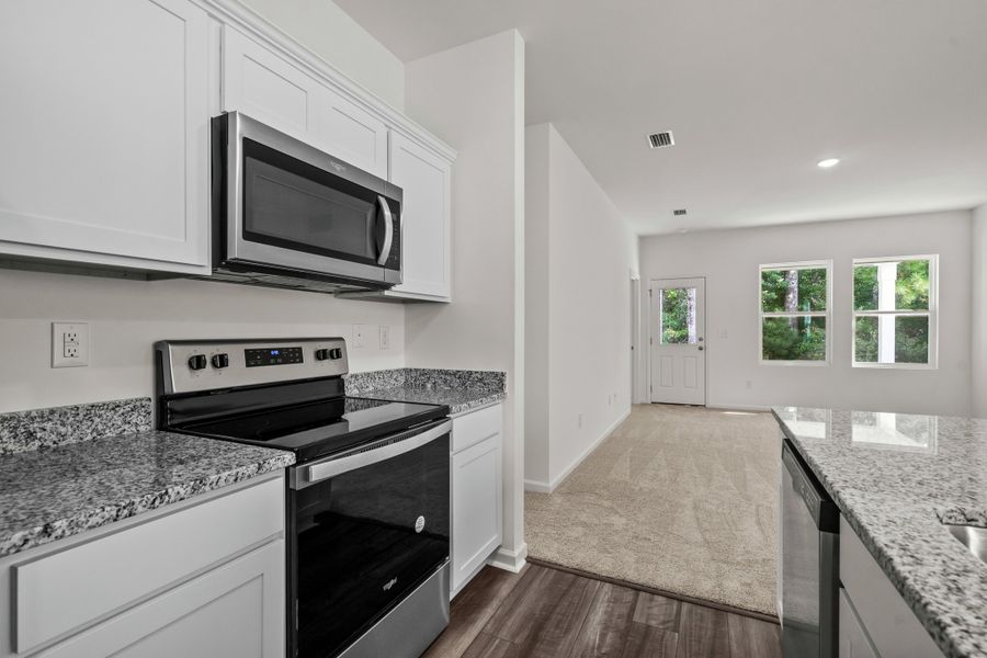 Representative furnished interior of a home built from the Sterling by Starlight Homes in Andalusia, Loris (Image 14).