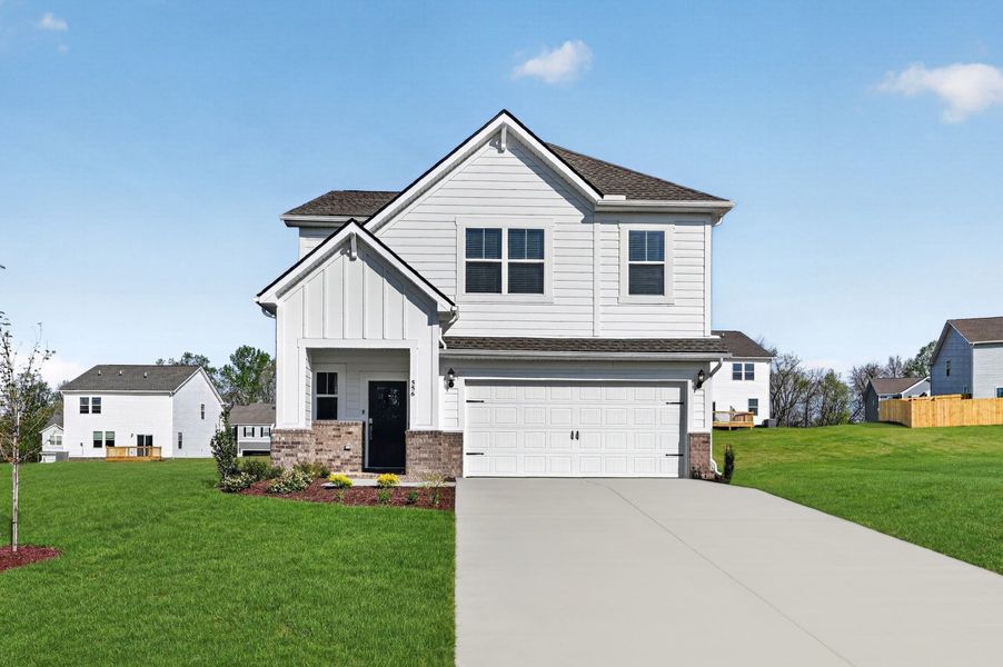Front exterior of a new home in Pleasant Grove Farms, Westmoreland, TN, highlighting curb appeal (Image 1). Front exterior of a new home in Pleasant Grove Farms, Westmoreland, TN, highlighting curb appeal (Image 1).
