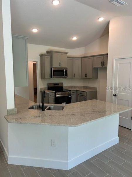 Furnished interior view inside a new home in North Port, North Port (Image 4).