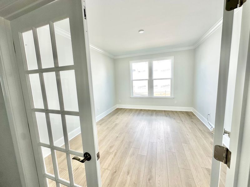 Spacious, unfurnished interior of a new home in Del Webb Wilmington at Mallory Creek, Leland (Image 15).