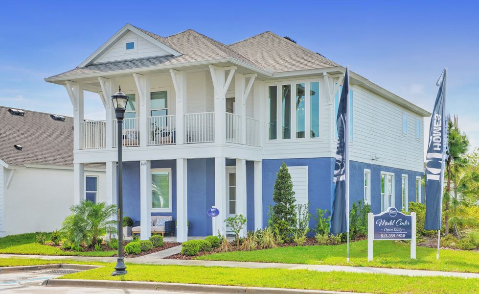 Front exterior of a new home in Persimmon Park, Wesley Chapel, FL, highlighting curb appeal (Image 2).