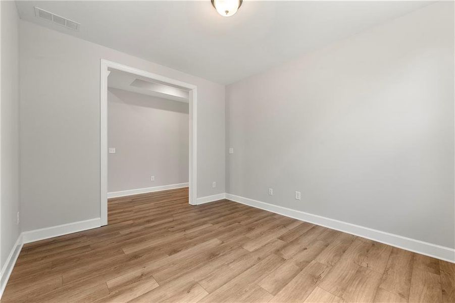 Spacious, unfurnished interior of a new home in Cresswind Georgia at Twin Lakes, Hoschton (Image 8).