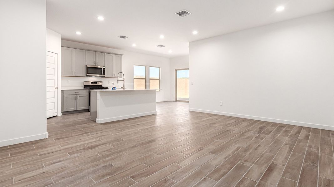 Representative unfurnished interior of a home built from the Baxter by D.R. Horton in The Oasis at Rocking K, Vail (Image 12).