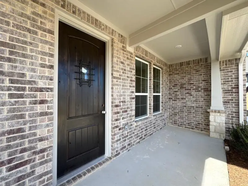 Exterior details and patio area of a home in Fairview Meadows, New Fairview (Image 3).