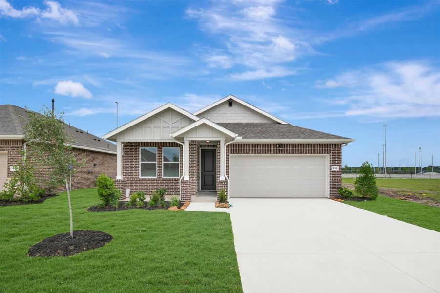 Front exterior of a new home in The Hills of Town Creek, Montgomery, TX, highlighting curb appeal (Image 2). Front exterior of a new home in The Hills of Town Creek, Montgomery, TX, highlighting curb appeal (Image 2).